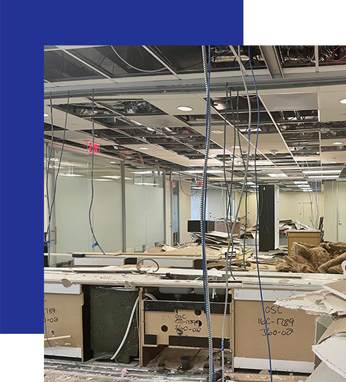 Access-Sciences-Blog-Top-Workplaces An office under renovation—exposed ceilings, wires, and debris—prepares for its top workplace transformation.